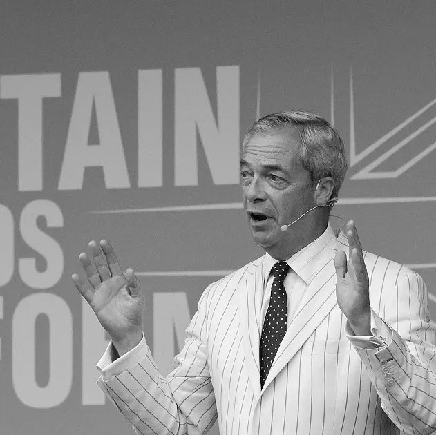 Nigel Farage speaking at a Reform UK event.